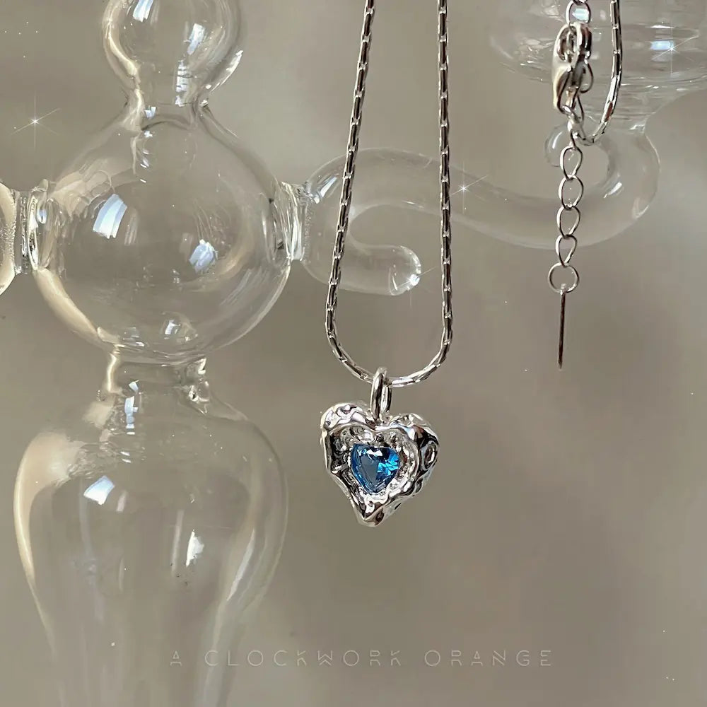 Deepsea Heart Necklace-Sterling Silver Blue Textured Heart Pendant with Center Blue Diamond Simulant，Irregular Design
