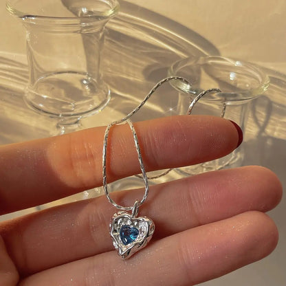 Deepsea Heart Necklace-Sterling Silver Blue Textured Heart Pendant with Center Blue Diamond Simulant，Irregular Design