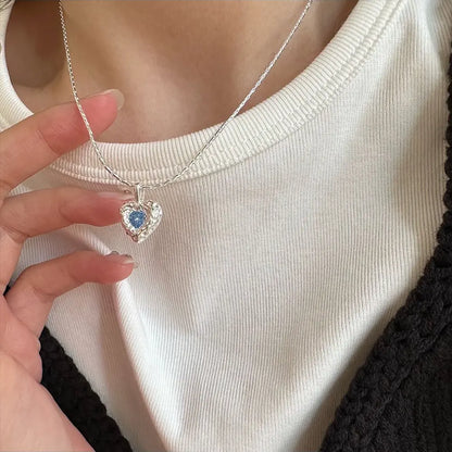 Deepsea Heart Necklace-Sterling Silver Blue Textured Heart Pendant with Center Blue Diamond Simulant，Irregular Design