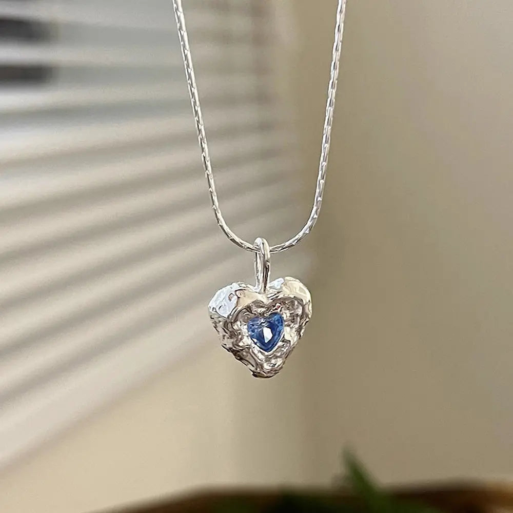 Deepsea Heart Necklace-Sterling Silver Blue Textured Heart Pendant with Center Blue Diamond Simulant，Irregular Design