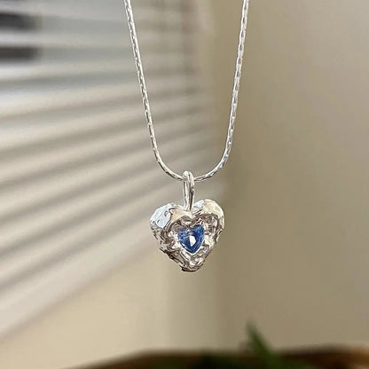 Deepsea Heart Necklace-Sterling Silver Blue Textured Heart Pendant with Center Blue Diamond Simulant，Irregular Design