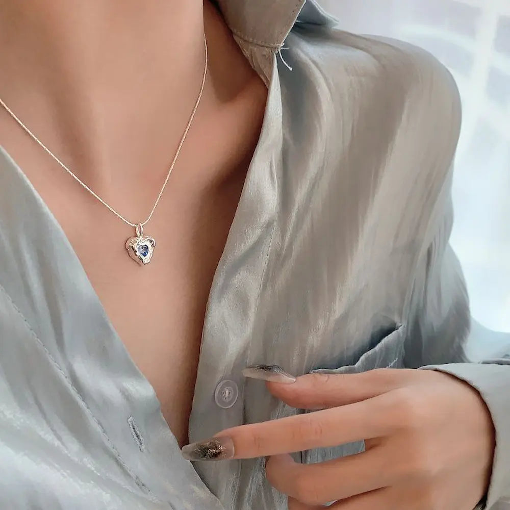 Deepsea Heart Necklace-Sterling Silver Blue Textured Heart Pendant with Center Blue Diamond Simulant，Irregular Design