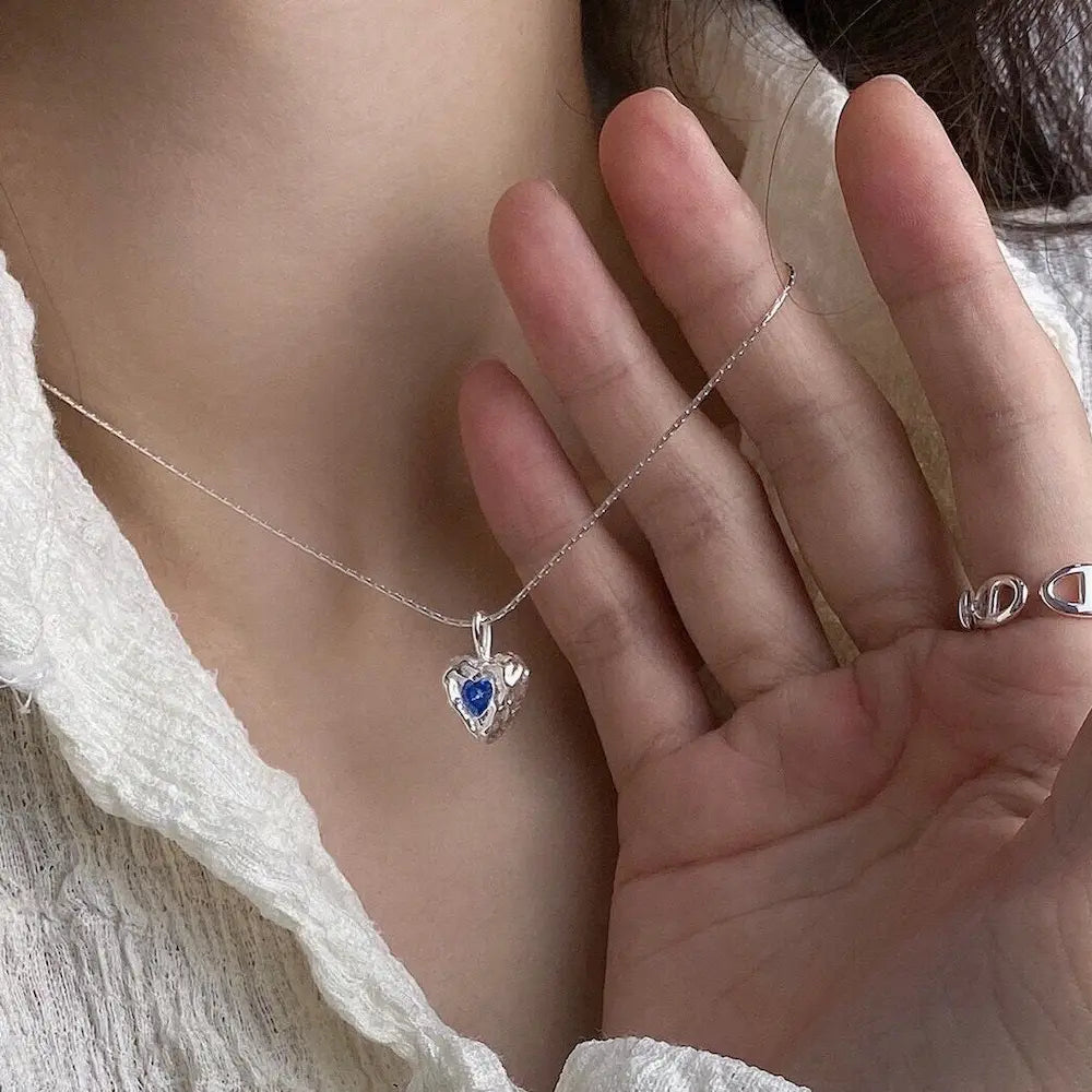 Deepsea Heart Necklace-Sterling Silver Blue Textured Heart Pendant with Center Blue Diamond Simulant，Irregular Design