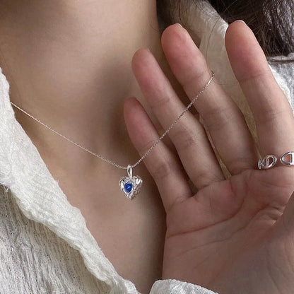 Deepsea Heart Necklace-Sterling Silver Blue Textured Heart Pendant with Center Blue Diamond Simulant，Irregular Design